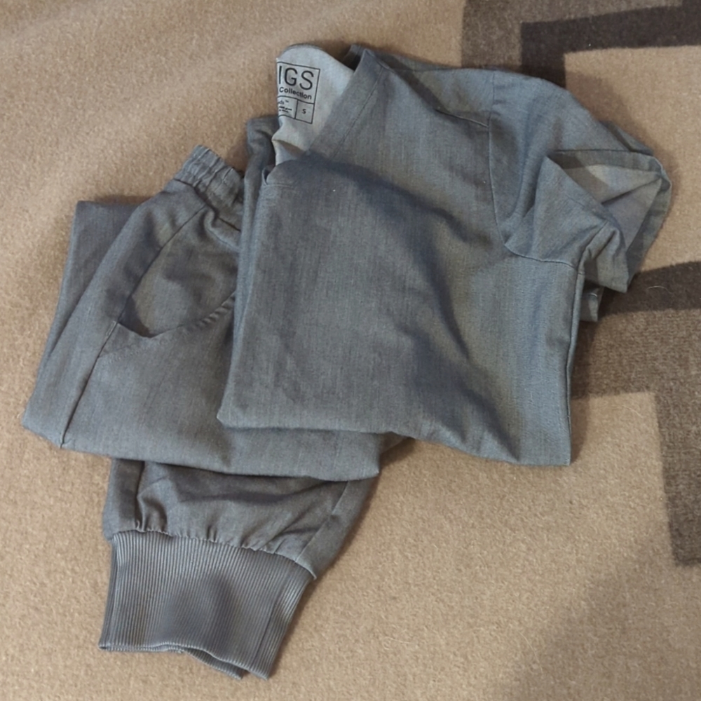 Grey figs scrubs.